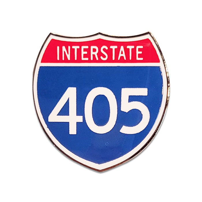 Shiny pin with Interstate 405 design on a white background.
