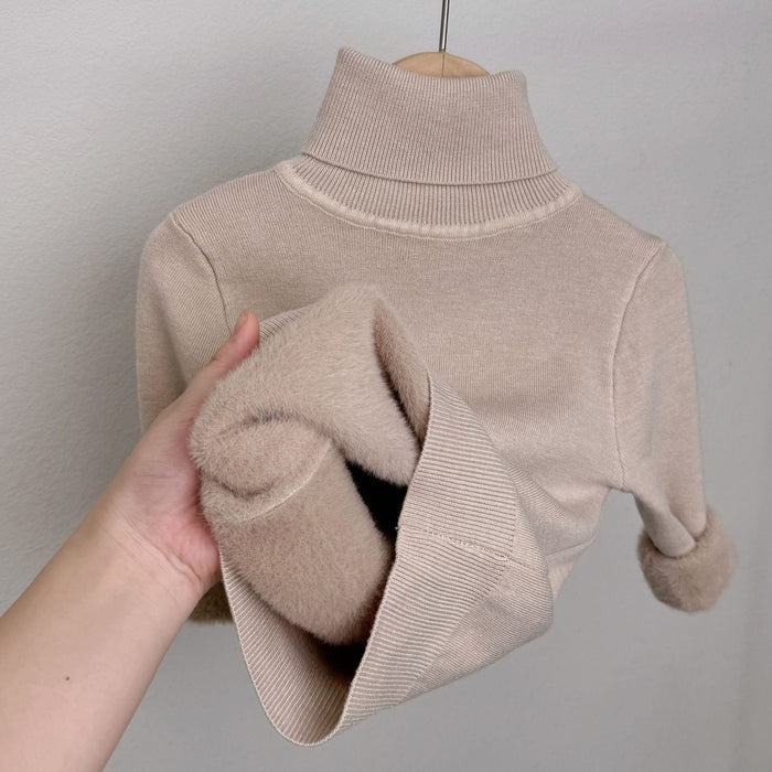 Lumi fleece-lined knit turtleneck sweater shown in a soft solid color