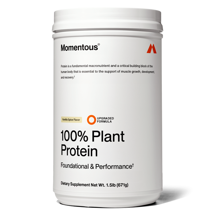 White jar of Momentous 100% Plant Protein powder in Vanilla Spice flavor.