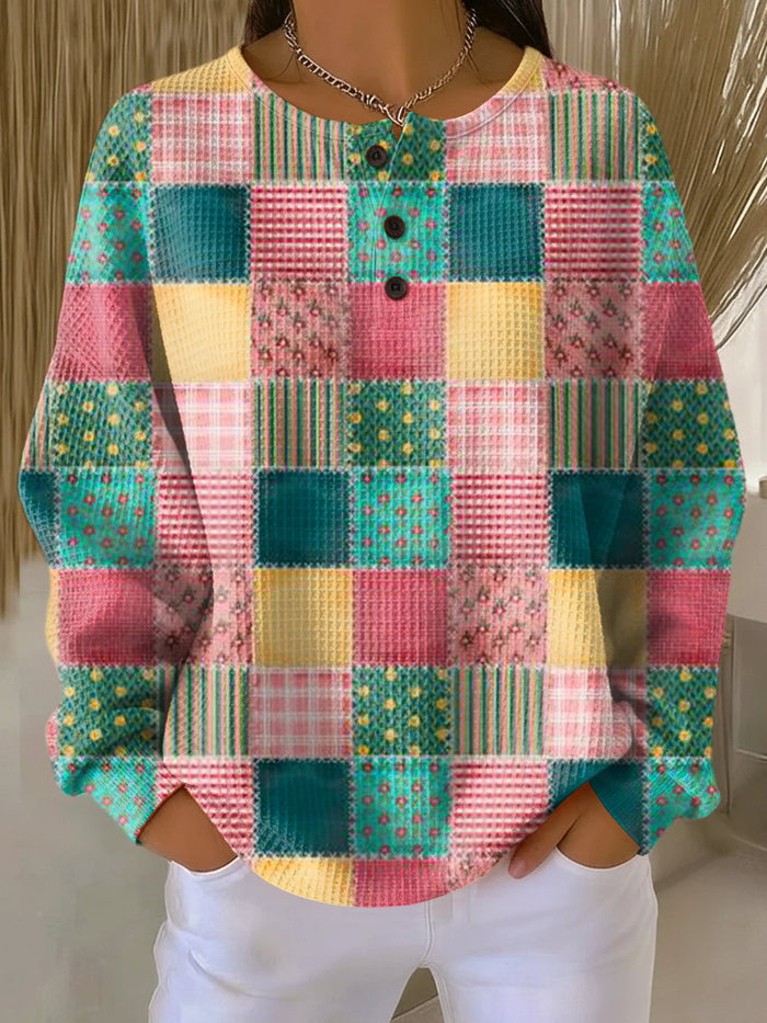 Women's cozy waffle-knit sweater with relaxed fit and soft brushed interior