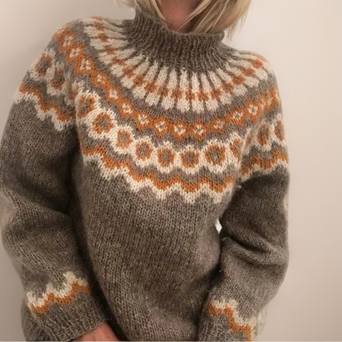 Amara Icelandic-style patterned knit sweater shown in orange, gray, blue and khaki