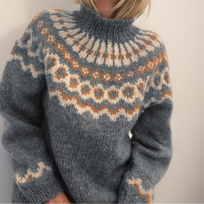 Amara Icelandic-style patterned knit sweater shown in orange, gray, blue and khaki