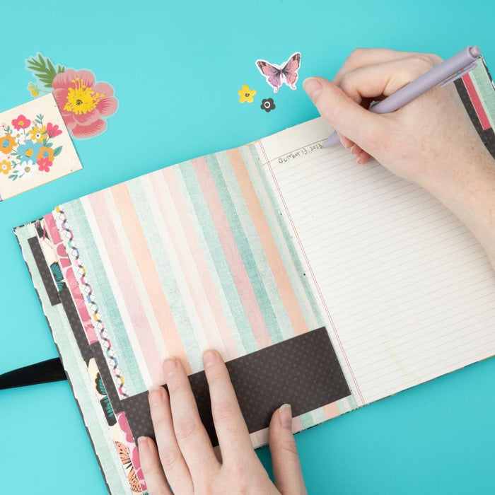 American Crafts - Ephemera Die-Cuts 66/Pkg - Icons, Gold Foil - April And Ivy. Introducing April and Ivy by American Crafts- a paper collection that effortlessly combines vintage allure, eclectic flair, and vibrant energy. Available at Embellish Away located in Bowmanville Ontario Canada. Example by brand ambassador.