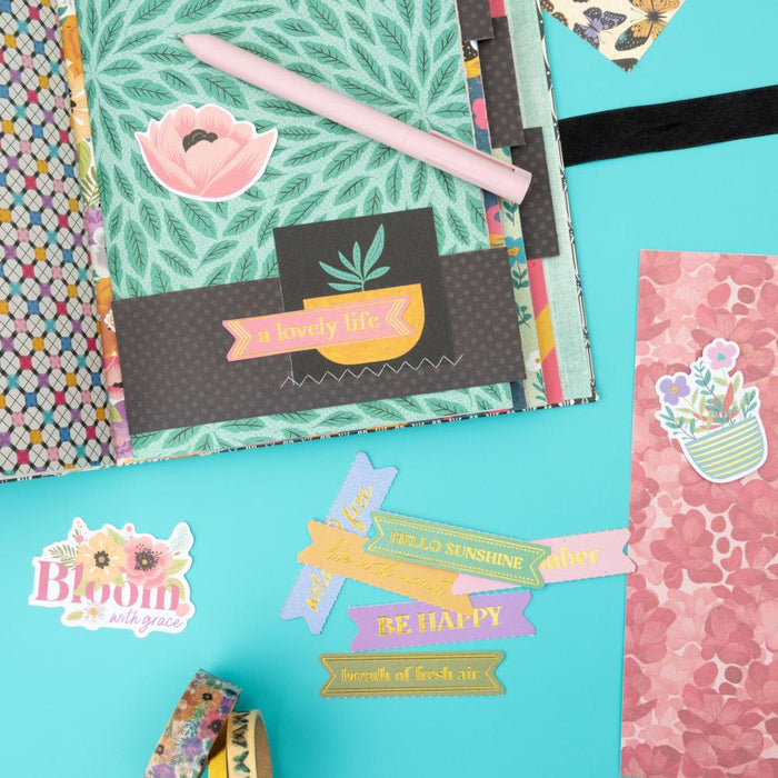 American Crafts -  Ephemera Die-Cuts 66/Pkg - Journaling, Gold Foil - April And Ivy. Introducing April and Ivy by American Crafts- a paper collection that effortlessly combines vintage allure, eclectic flair, and vibrant energy. Available at Embellish Away located in Bowmanville Ontario Canada. Example by brand ambassador.