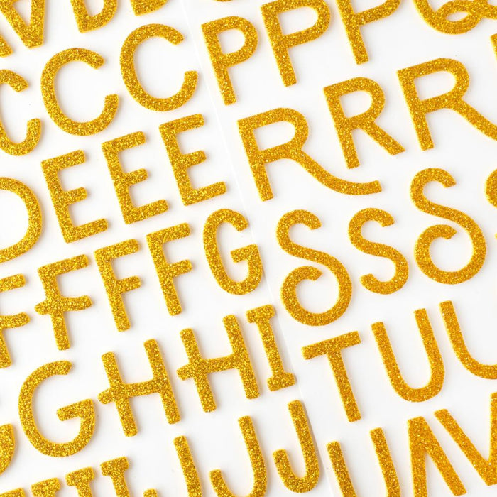 American Crafts - Thickers Stickers - 141/Pkg - Alpha Gold Glitter - April & Ivy. Introducing April and Ivy by American Crafts- a paper collection that effortlessly combines vintage allure, eclectic flair, and vibrant energy. Available at Embellish Away located in Bowmanville Ontario Canada.