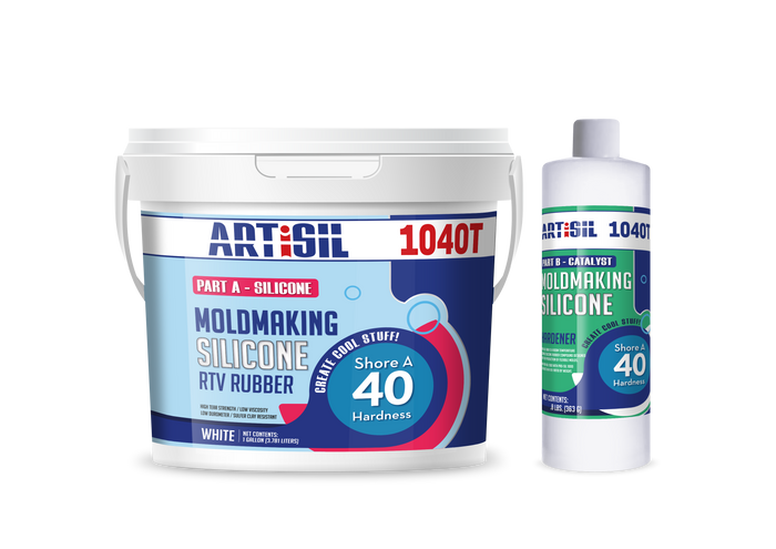 Gallon white plastic tub of ArtiSil 1040T silicone mold making rubber with small bottle of hardener sitting next to it.