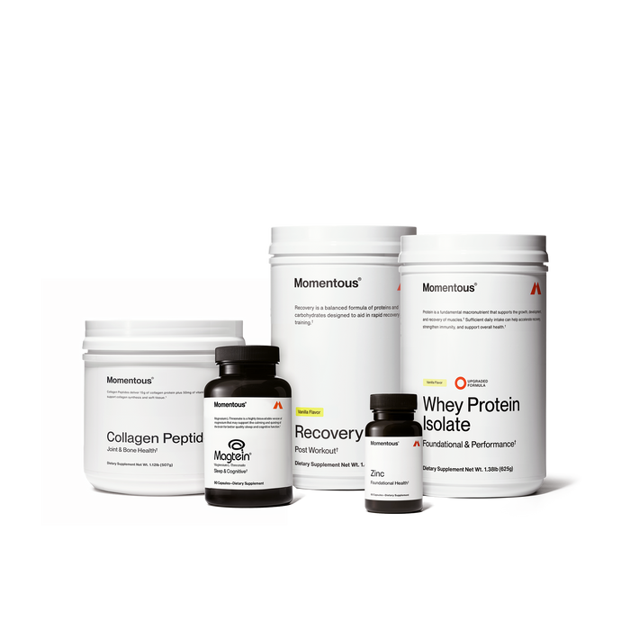 Five Momentous supplement containers arranged in a row, including collagen peptide powder, magnesium capsules, recovery powder and zinc capsules.
