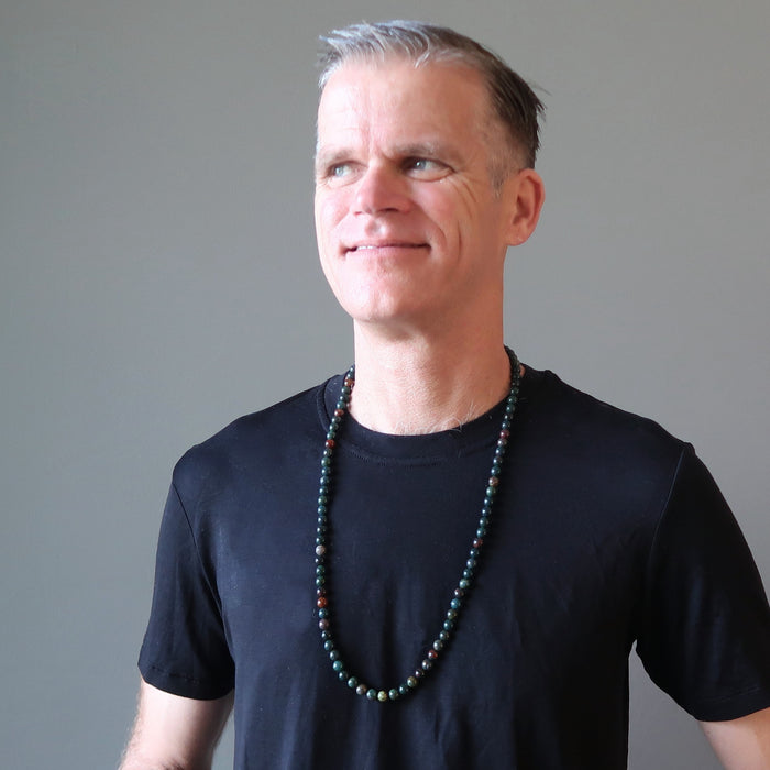 male wearing female wearing bloodstone necklace