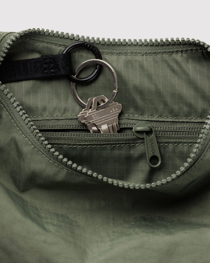 Caper Small Crescent Bag