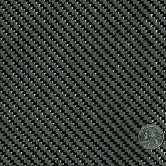 Square swatch of twill weave carbon fiber fabric with a quarter sitting in corner for size reference.