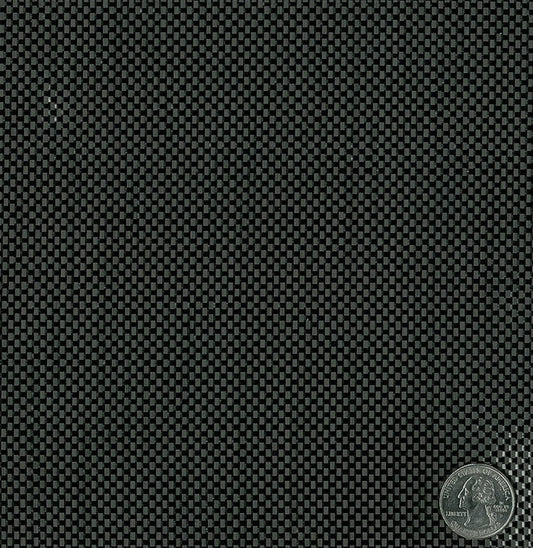 Carbon fiber fabric plain weave close up. Has quarter laying on top for carbon weave size reference.