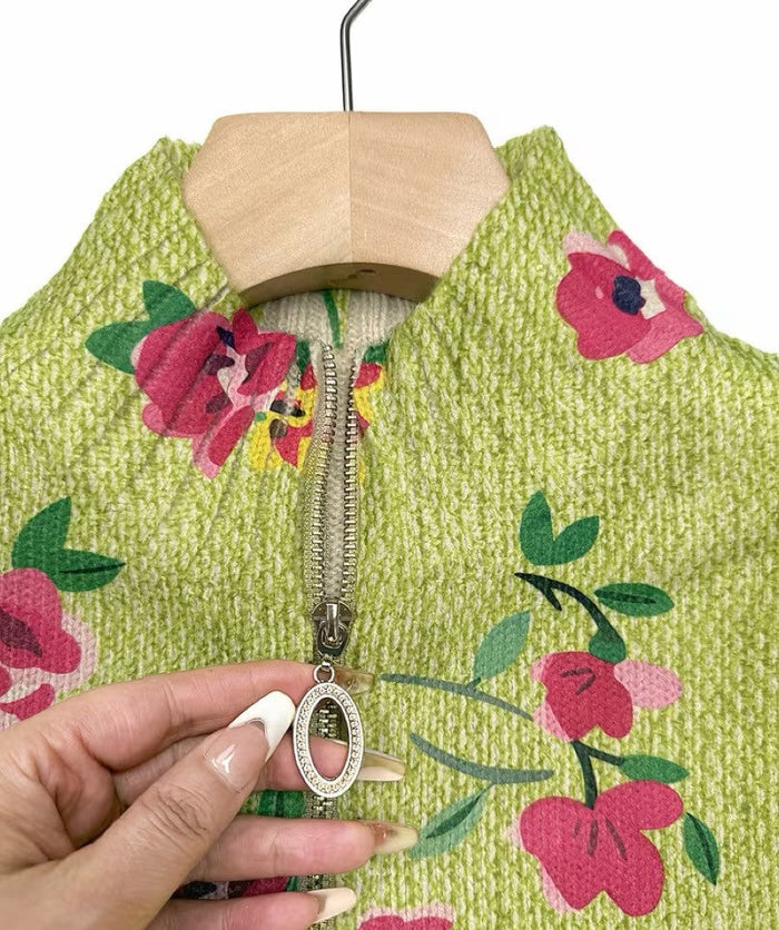 Lime green zip cardigan with pink and coral floral print, metal zipper and ribbed cuffs