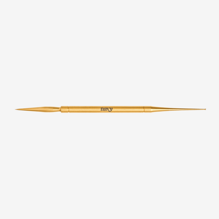 Gold tool with 'Navy' branding on a white background