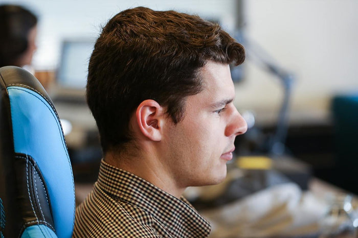 man wearing EARasers Peace and Quiet Earplugs