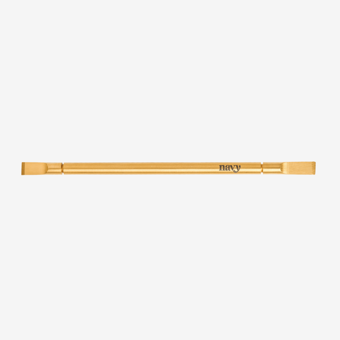 Gold-colored tool with 'Navy' branding on a white background