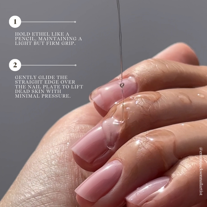 Close-up of a hand with pink nails being filed, with text instructions on a gray background.