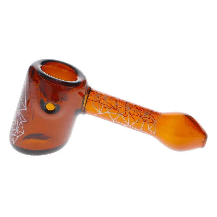 A close-up, angled view of the Famous Design Space Hammer Pipe in amber, showcasing its patterned glass design.