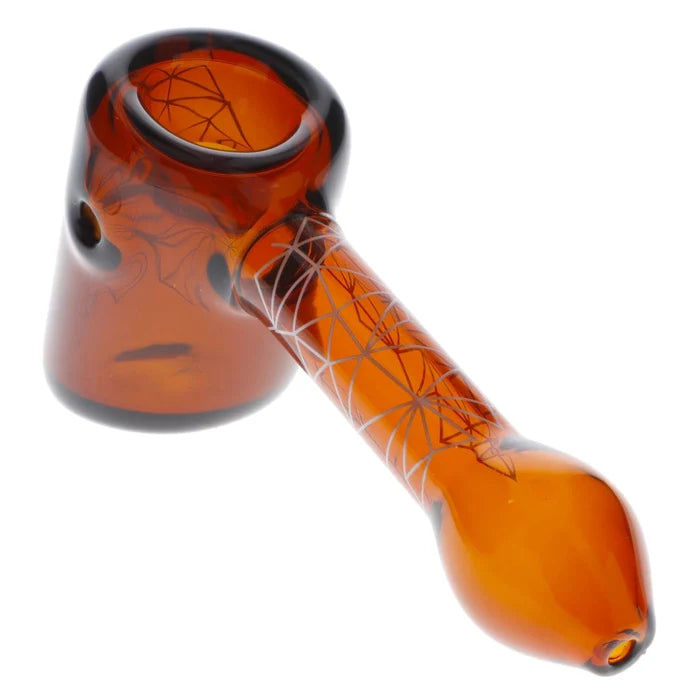 Front view of the 5-inch Famous Design Space Hammer Pipe in amber glass, featuring a geometric pattern.
