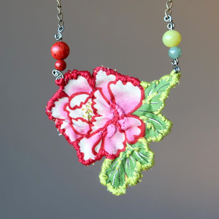 front of Red Coral Green Aventurine Serpentine Flower Embroidered Necklace
