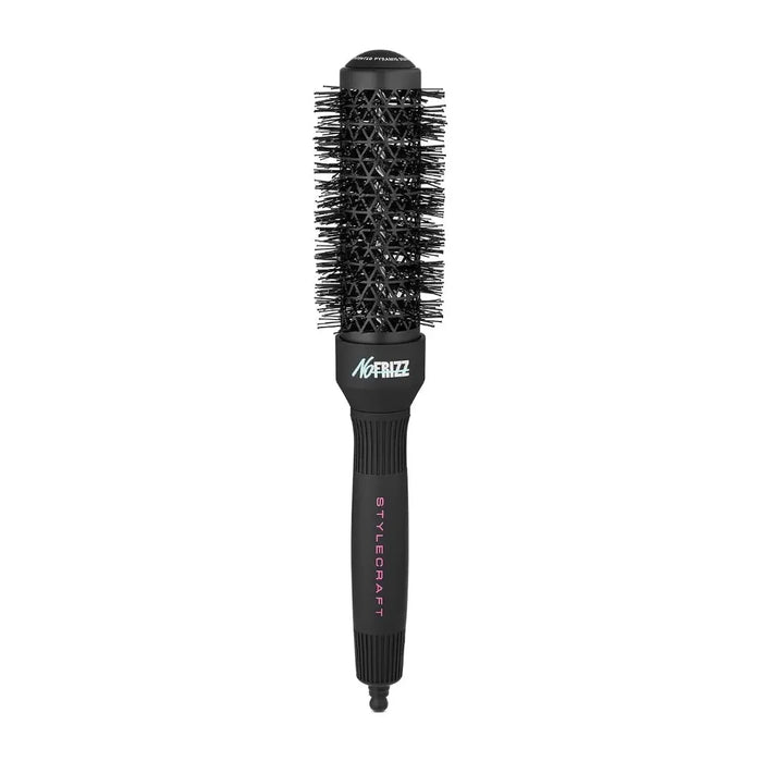A black round hairbrush with black bristles, featuring the 'Mizz' brand logo in white on the neck and pink vertical text reading 'STYLEREAFT' on the handle, set against a plain white background.