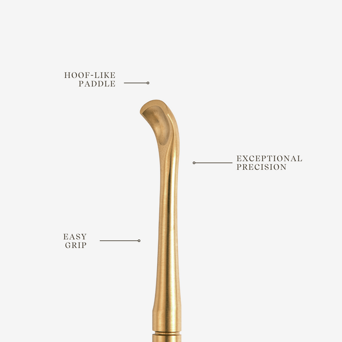 Gold tool with labeled features on a white background