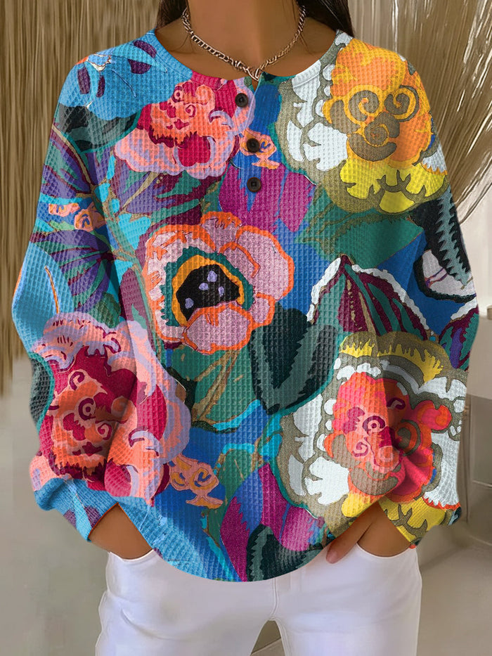 Ida women's waffle knit sweater with large colorful flowers and relaxed fit