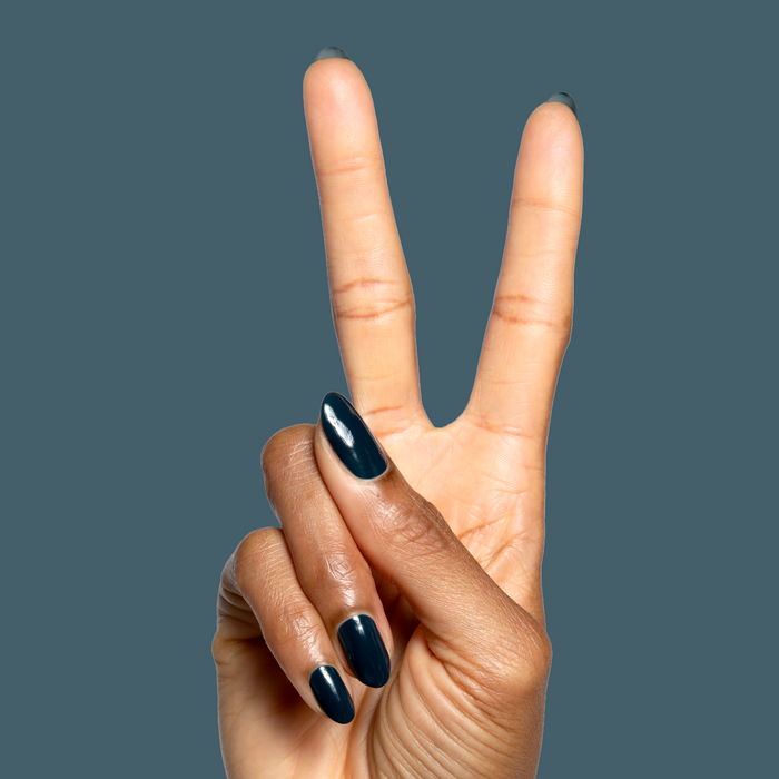 I'm Just Looking ultra deep teal gel polish on long natural nails for a polished at home mani by Olive and June
