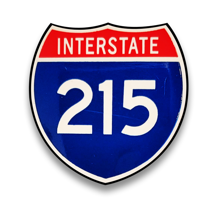 Interstate 215 sign with red top and blue bottom on a white background.