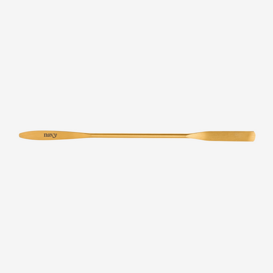 Gold-colored tool with 'Navy' branding on a white background