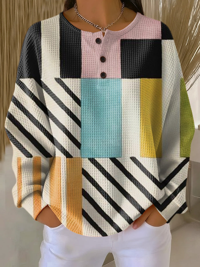 Karin women's waffle-knit sweater with a colorful check pattern and relaxed fit
