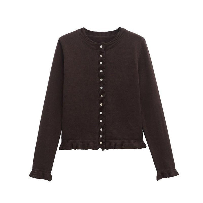Kiana button-up cardigan with lettuce trim, shown in a relaxed cozy silhouette