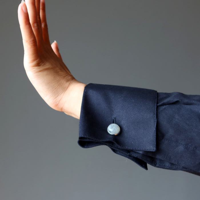 labradorite cufflinks on woman wearing black french cuff shirt