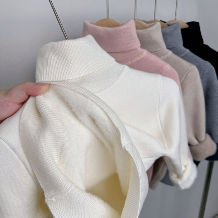 Lumi fleece-lined knit turtleneck sweater shown in a soft solid color