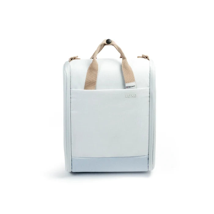 A white CPAP insert with beige fabric handles and a small 'LUXE' logo on the front, shown against a plain white background.