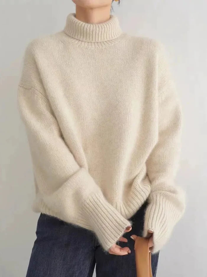 Marianne luxe turtleneck sweater shown in khaki, a soft knit with a classic rolled collar