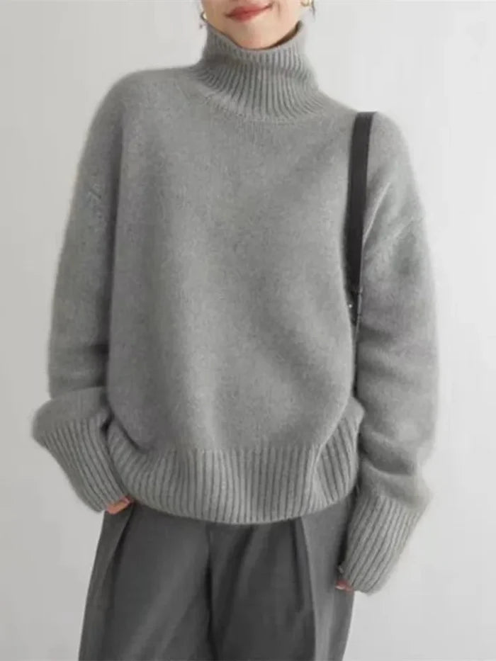 Marianne luxe turtleneck sweater shown in khaki, a soft knit with a classic rolled collar
