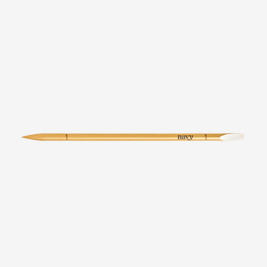 Orange wood stick manicure tool