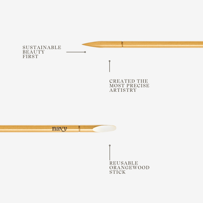 Orange wood stick manicure tool  with 'navy' branding on a white background, featuring text about sustainability and precision.