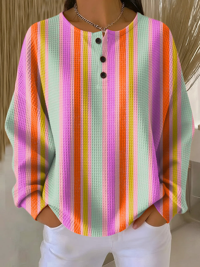 Mille women's waffle-knit sweater with colorful rainbow stripes and relaxed fit
