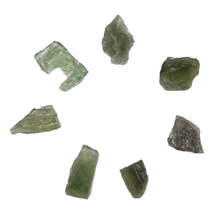 7 green raw moldavite tektites