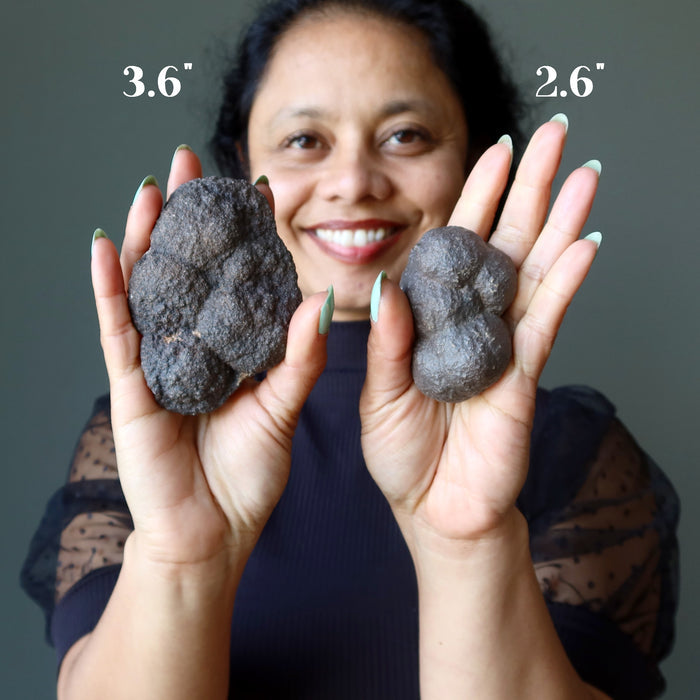 sheila of satin crystals holding brown moqui marble clusters