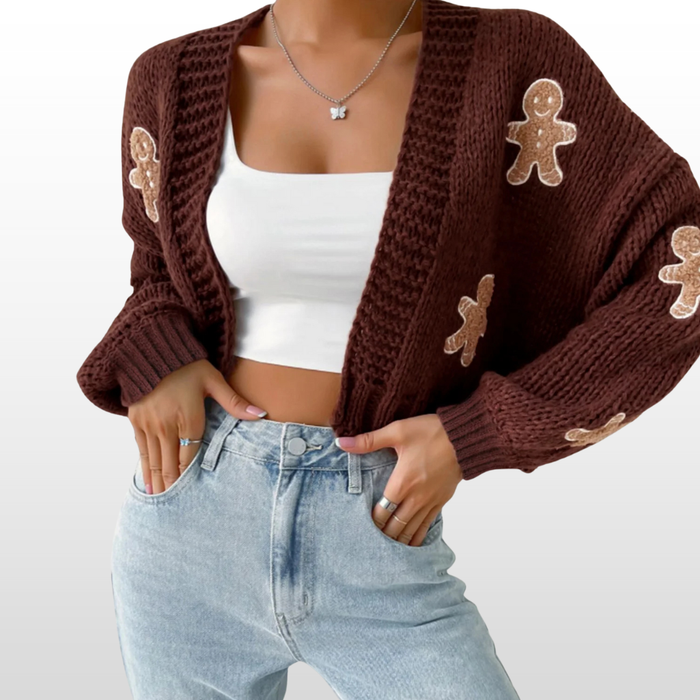 Woman wearing a casual open front knit cardigan in a neutral shade