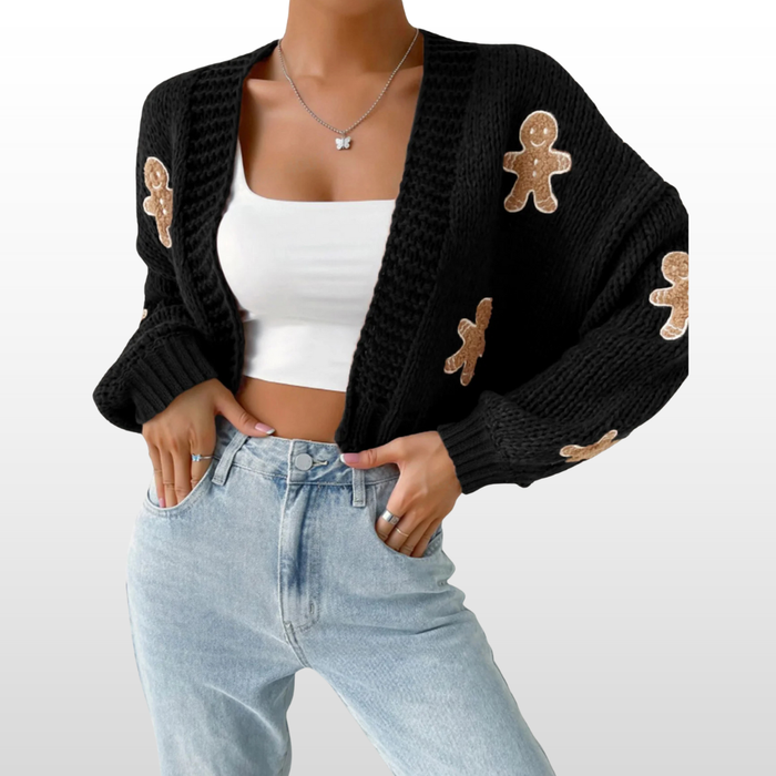Woman wearing a casual open front knit cardigan in a neutral shade