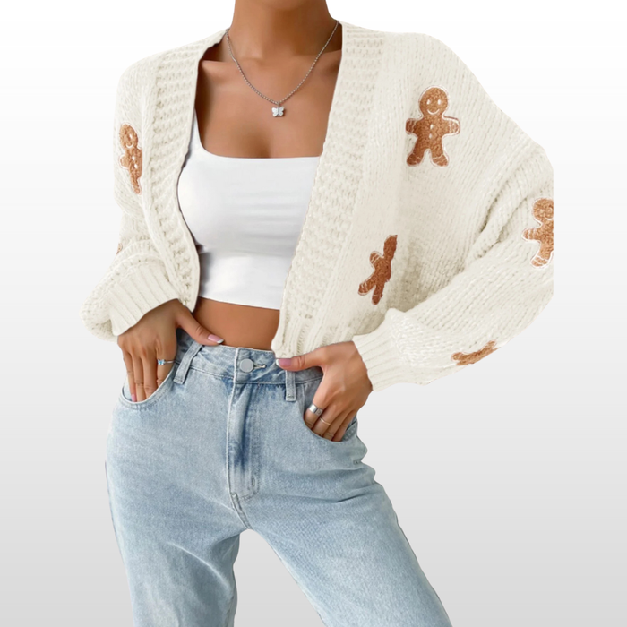 Woman wearing a casual open front knit cardigan in a neutral shade