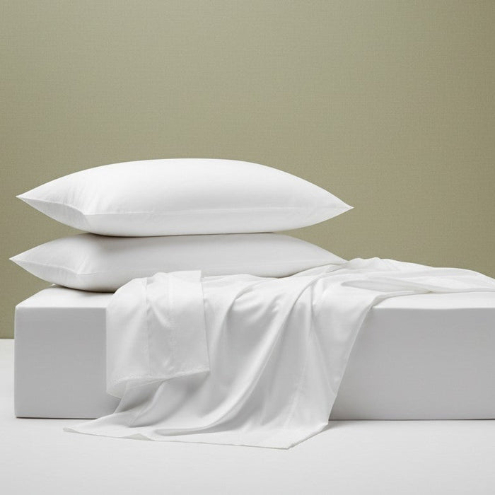 Close-up of sateen weave bed sheets showing lustrous finish and premium quality