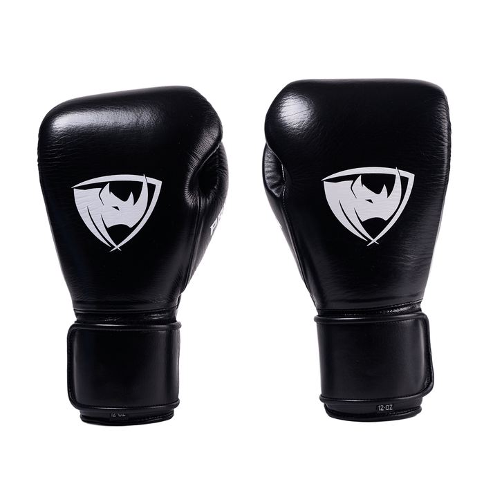 PROLAST PG professional boxing gloves in charcoal black with Velcro strap, pair front view with white rhino logos