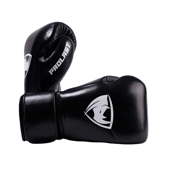 PROLAST PG professional boxing gloves in charcoal black with Velcro strap, one upright side-on, one lying with rhino logo