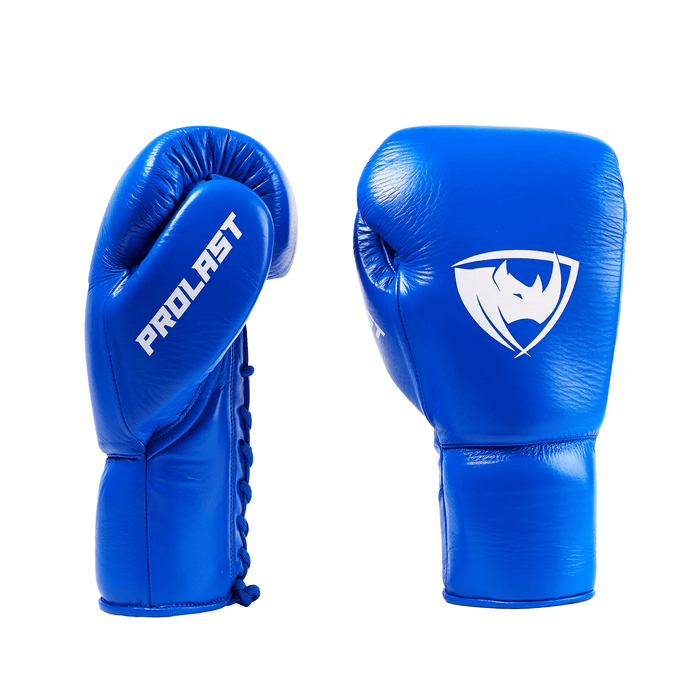 PROLAST PG professional lace-up boxing gloves in cobalt blue, pair showing the PROLAST thumb side, laces and rhino logo