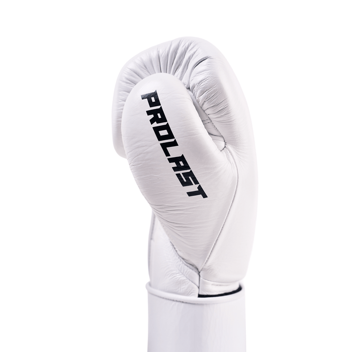 PROLAST PG professional boxing gloves in Columbian white, close-up of one glove's side with black PROLAST lettering