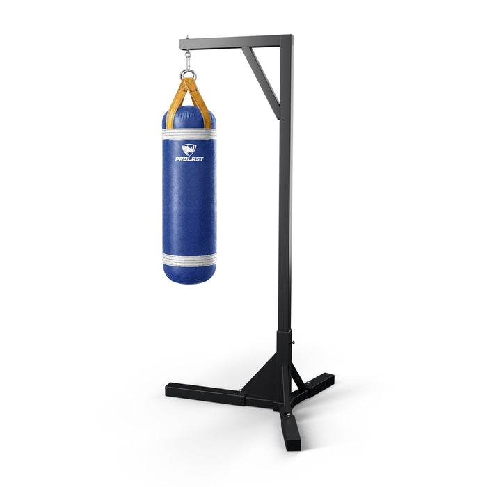 PROLAST 4 ft 80 lb stock heavy bag, royal blue with white trims and yellow straps, hanging from a PROLAST single bag stand on a steel snap hook through its D-rings (stand sold separately)
